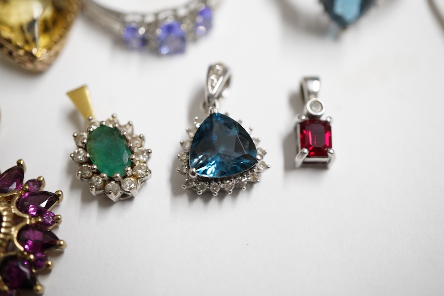 A small group of jewellery to include, four modern 9ct gold and gem set rings including garnet and seed pearl cluster and sapphire and diamond cluster, one other modern 9k and gem set ring, five assorted 9ct and gem set